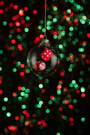 Christmas ornament with poker game element in red and green