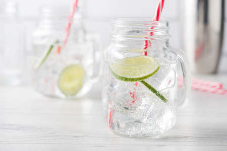 Fresh home made gin tonic cocktails with limeの写真素材