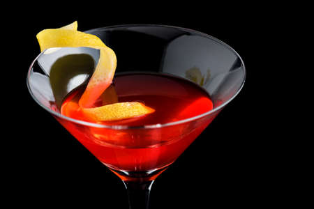 cosmopolitan cocktail with garnish on black backgroundの写真素材