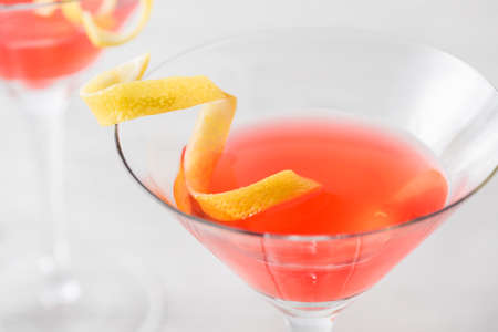 Fresh home made cosmopolitan cocktails with garnishの写真素材