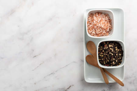 Himalayan Salt and red as well black pepper cornの写真素材
