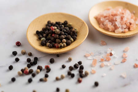 Himalayan Salt and red as well black pepper cornの写真素材