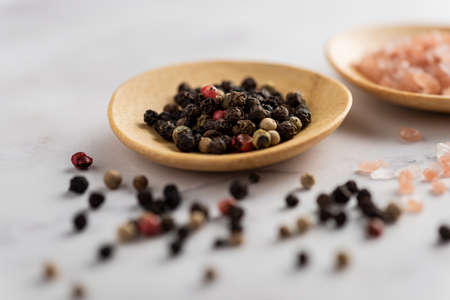 Himalayan Salt and red as well black pepper cornの写真素材