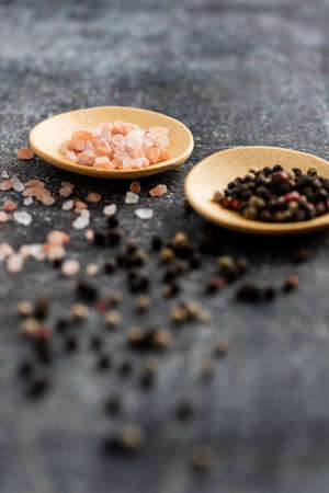 Himalayan Salt and red as well black pepper cornの写真素材