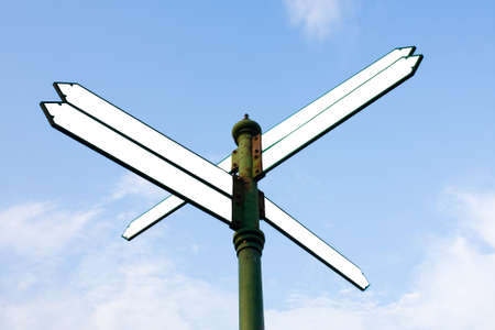 Many direction signs in the sky. To tell the way places.の写真素材