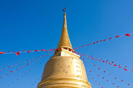 Golden Mountain attractions. Temples in Bangkok on bright
の写真素材