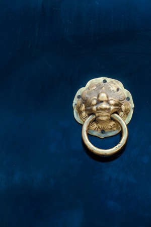 The entrance door is the lion. Made of brass