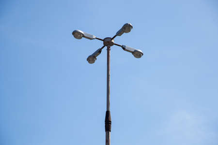 Electric lighting fixture with four lamps with single pole.