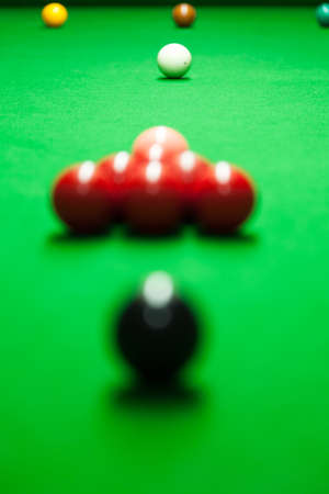 Snooker balls on a table. Ready to start playing. Matching the color and placement of colors.