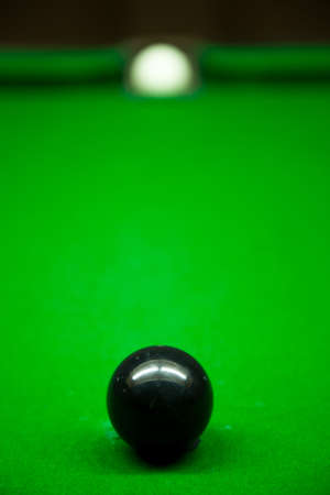 Snook white and black. Placed on the pool table. Ready to play in the tournament.の写真素材