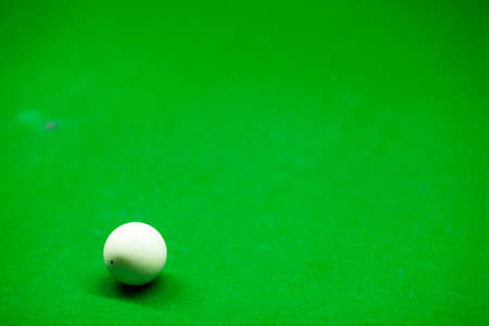 Snooker white. Placed on a snooker table. The white ball to shoot colored balls in order to score.の写真素材