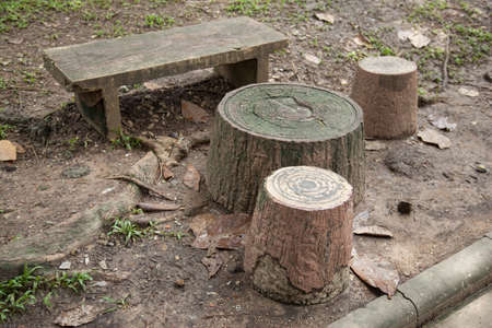 Chairs and tables made ââof stone like the trees, but imitation is placed in the garden.の写真素材