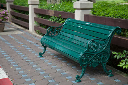 Chair of the bench in the park. Set on the sidewalk. All areas within the park.の写真素材