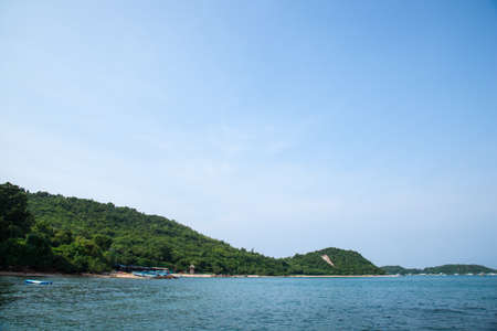 Beach attractions of Pattaya Koh Larn. Tree covered mountains of Koh Larn.の写真素材