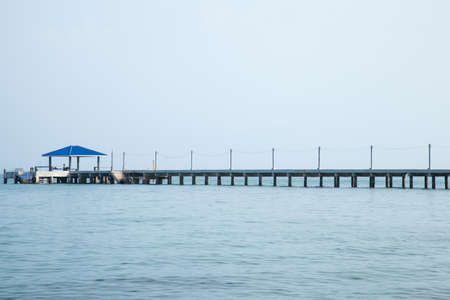 Bridges, pavilion, bridges and out to sea with the mountains in the background.の写真素材