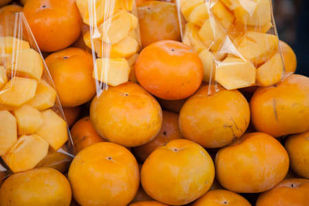 persimmons said the deer was in the market. There are a number of sales.の写真素材