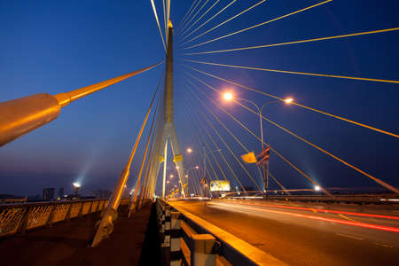 Bridges and roads evening. Vehicle traffic on the road quickly. The atmosphere, the sky began to darken.のeditorial素材