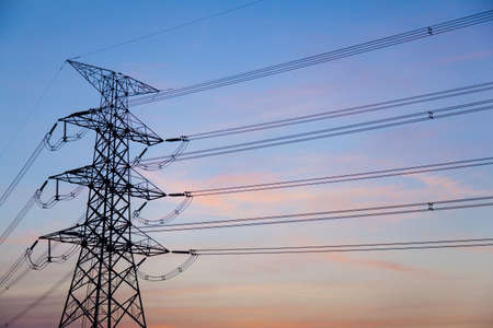 High voltage towers. High voltage power electric transmission towers of a power plant to the substation.の写真素材