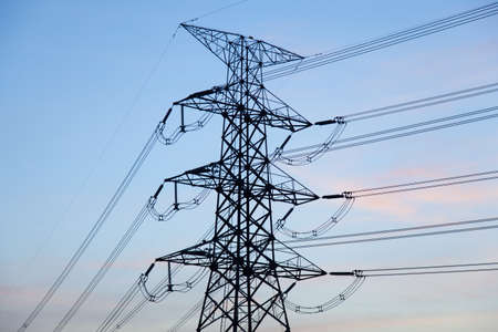 High voltage towers. High voltage power electric transmission towers of a power plant to the substation.の写真素材