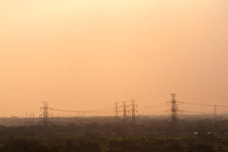 electricity network. Living in a rural area into the city during the evening.の写真素材