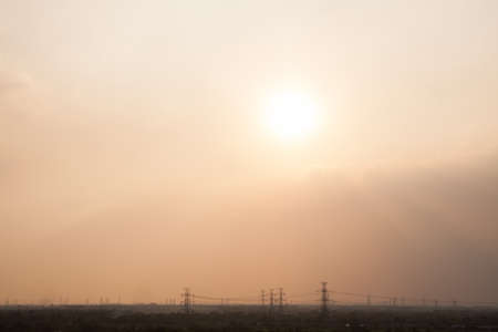 electricity network. Living in a rural area into the city during the evening.の写真素材