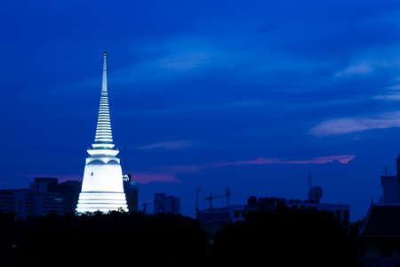 Pagoda Temple in the evening. Atmosphere near darkness. The sky is dark. And pagodas lit.の写真素材