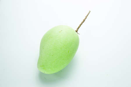 mango is a mango one shot in a white studio background.
