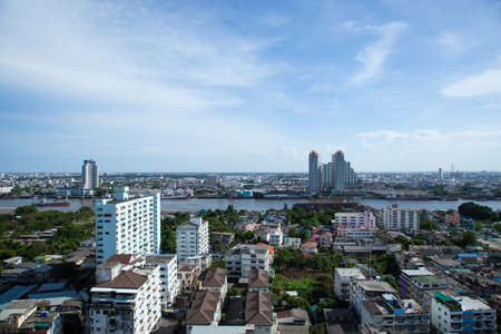 High angle view of Bangkok's tallest building boat houses. River and harbor transportation.の写真素材