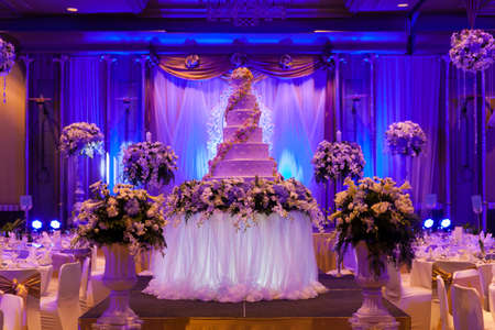 Marriage celebration with cake, banquet table. Flowers and decorations.のeditorial素材