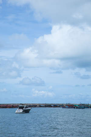 Boat moored ships at seaの写真素材