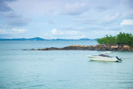 Boat moored at sea. A boat for tourists. Near the coast.の写真素材