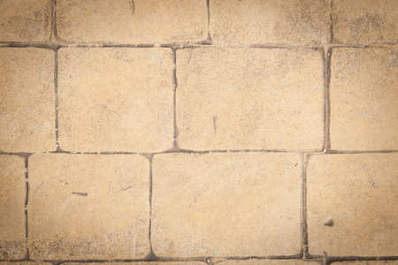 Brown old wall rectangular wall signs of erosion.の写真素材