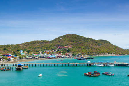 Fishing boats moored in the harbor. The long Bridge landing. Behind the mountains.の写真素材
