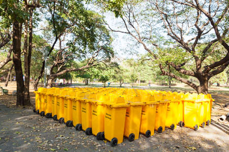 Yellow bins Many are located in the garden area. Cleaningの写真素材
