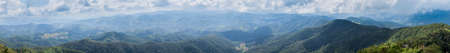 panorama mountain forest and sky.trees and forest cover high mountains.の写真素材