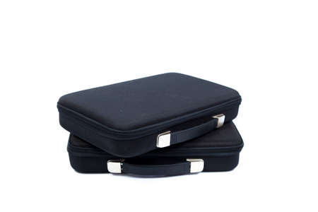 Black briefcase overlapping on white isolated background. and packshot white isolated studio.