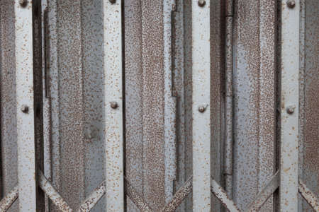 Door aluminum background. Old rusty stains on the door.の写真素材