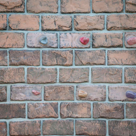 Stacked brick wall of the building wall. Brick lined up in a mess.