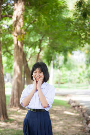 girl smile and relaxed. Asian Girl in the park.の写真素材