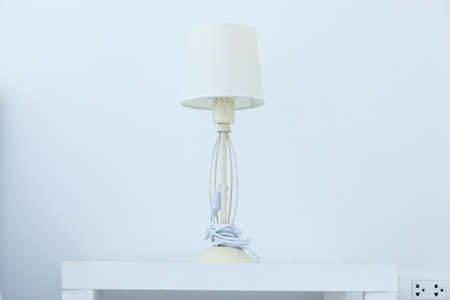 Lighting. Using wood as an ingredient. Set on a table in the bedroom.の写真素材