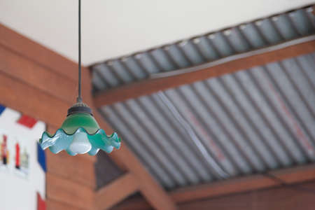 Lighting classic shapes hanging from the ceiling of the house.の写真素材