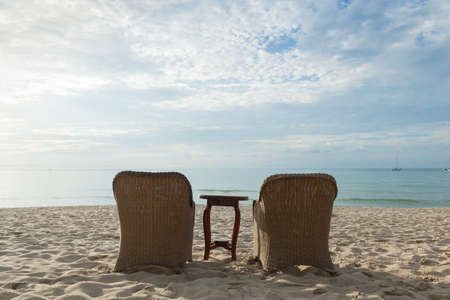 Chairs and tables on the beach Near the sea Relaxing on the beachの写真素材