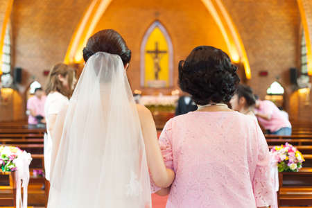 Bride in wedding ceremony Wedding in a church wedding rites of Christianity.の写真素材