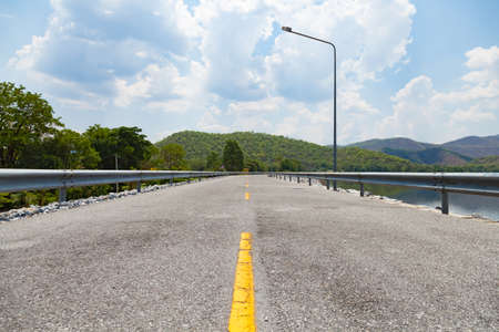 Central Street water storage dams on the front edge of the mountains in the afternoon heat.の写真素材