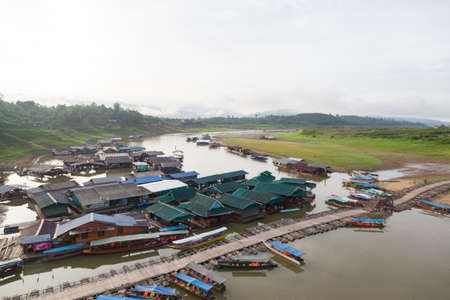 Wooden bridges and water back home in the mountains and forests Sagklaburi. Kanchanaburi, Thailandの写真素材