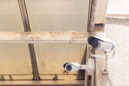 CCTV camera mounted on the ceiling and wall. For security check
