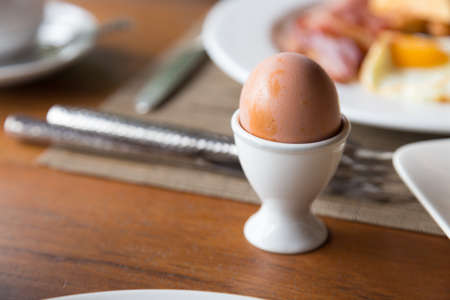 Boiled eggs laid on the table. Breakfast in the restaurant.
