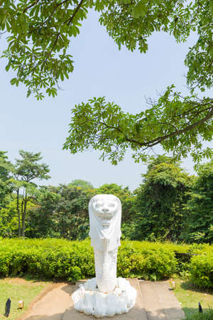 Merlion statue in park. in park tree near and top mountain.のeditorial素材