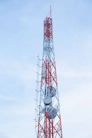 Large telecommunications cell tower. Wireless telecommunications signaling system, located on high...