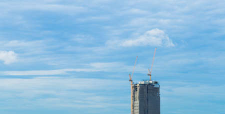High Rise Buildings. Tallest building in the city are under construction. Behind the skiesの写真素材